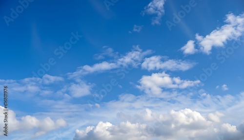 An image of a landscape with a clear sky and white clouds