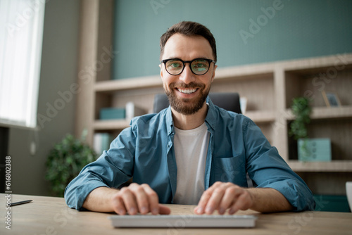 Pov Shot Of Handsome Young Male Entrepreneur Using Computer At Office