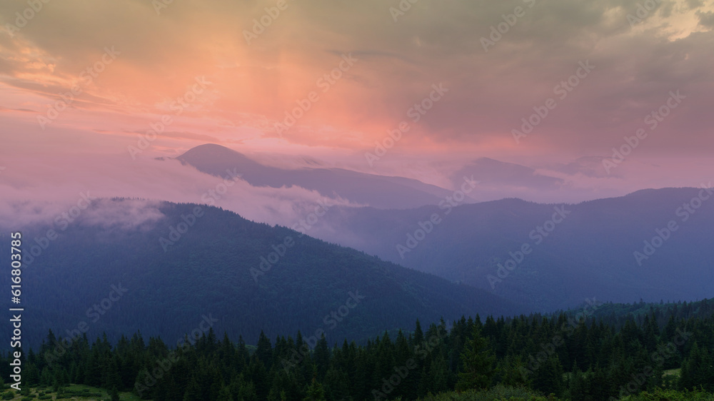 Surrealistic mountains sunset. Unusual landscape. Copy space abstract background.