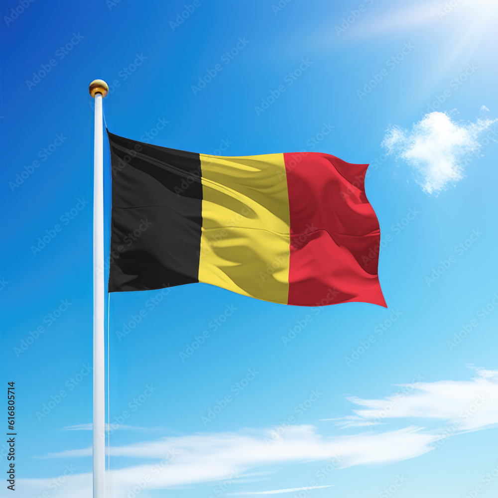 Waving flag of Belgium on flagpole with sky background. Waving flag of Belgium on flagpole with sky background.