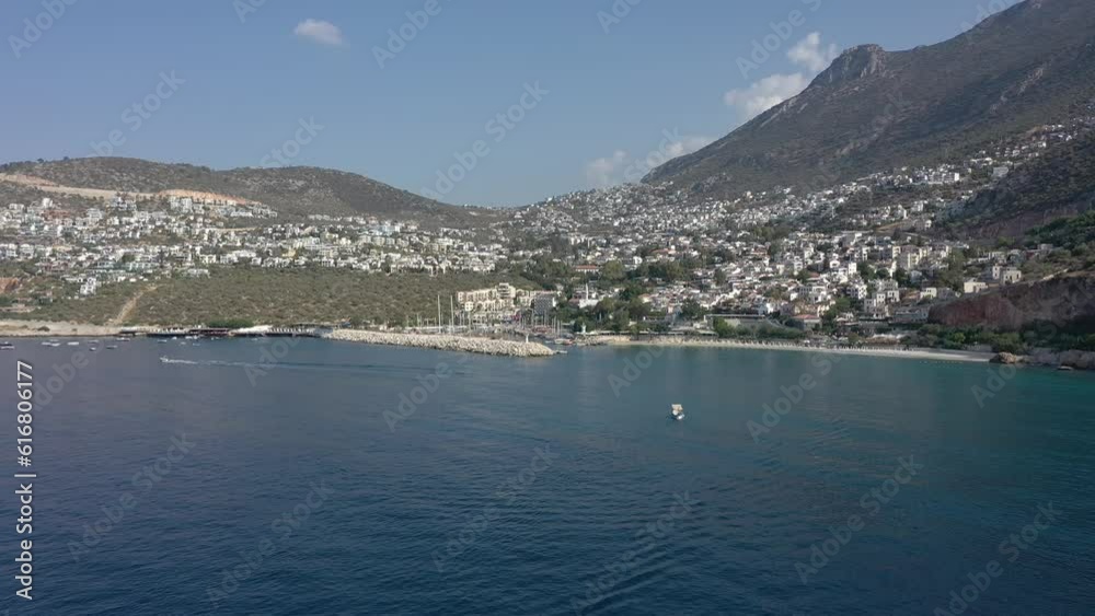 Aerial view of Kalkan town with marina, yachts, houses and streets Aerial view of Kalkan town with marina, yachts, houses and streets