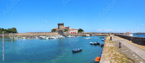 Fototapeta Naklejka Na Ścianę i Meble -  Located in the hollow of the bay of Ciboure and Saint-Jean-de-Luz, Socoa, a small fishing port from where the whalers left in the Middle Ages, is characterized by the crenellated tower of its fort.