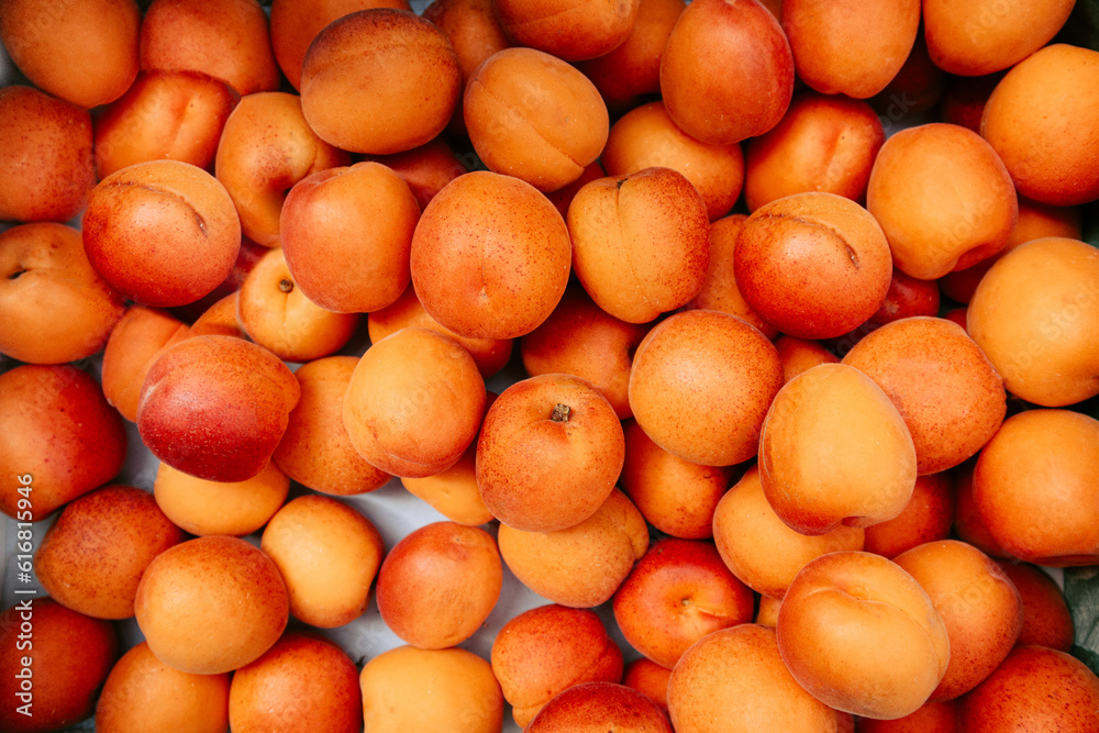 Fresh peaches on sale on a green market