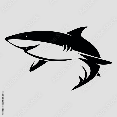 The black silhouette of a shark. Vector icon on a gray background