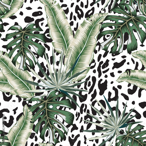 Tropical monstera palm leaves, leopard spots animal print background. Seamless pattern. Vector illustration. Exotic plants. Summer beach floral design