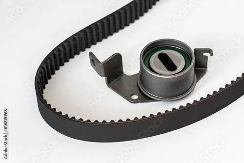 Kit of timing belt with rollers on a white background isolated. Auto Parts. Spare parts for the repair of cars.