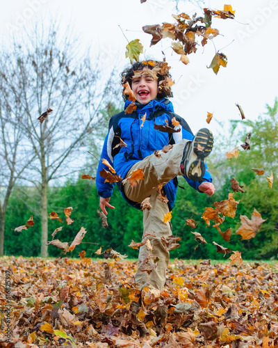 Photography Portrait of Latin American chile enjoying the Autumn season in Toronto, Canada