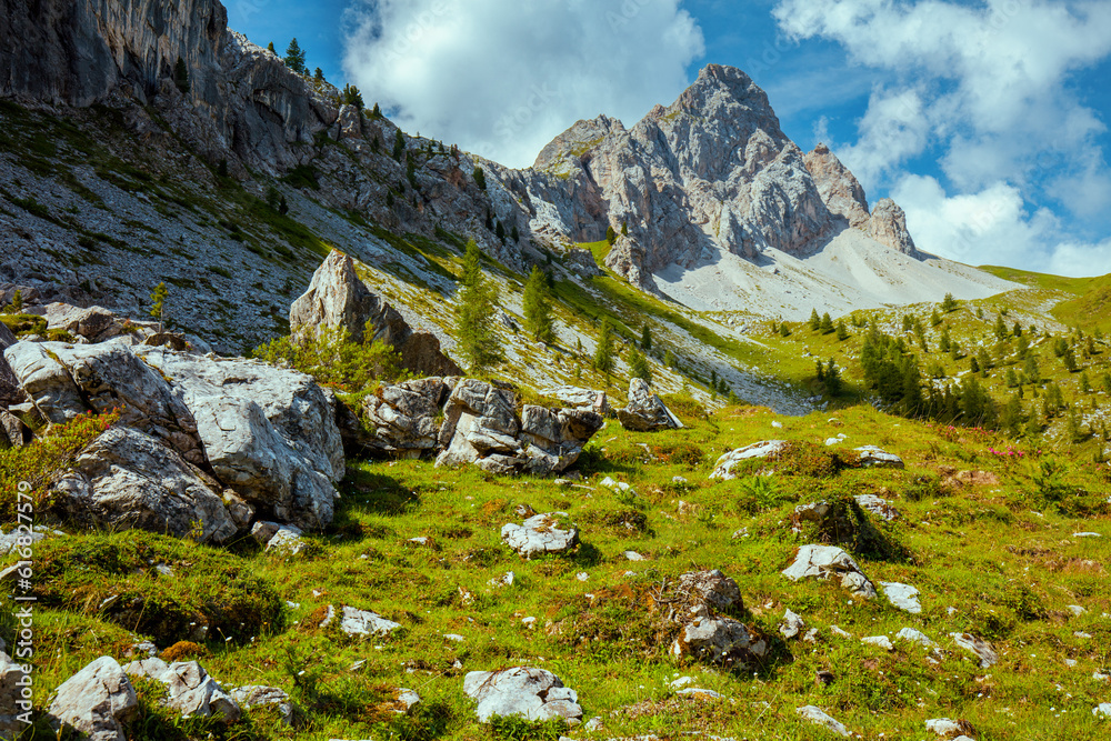 landscape with mountains, clouds and rocks