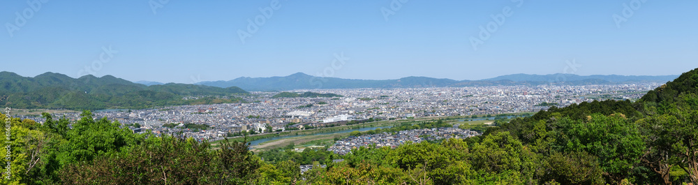 Panoramic view of Kyoto city from Arashiyama Monkey Park Iwatayama in Kyoto, Japan.