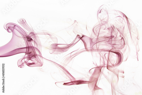 Abstract backdrop with stains of dark pink incense smoke