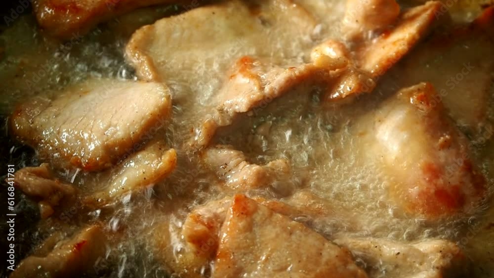 Man is frying chopped pork with oil in pan , Thai famous food Man is frying chopped pork with oil in pan , Thai famous food