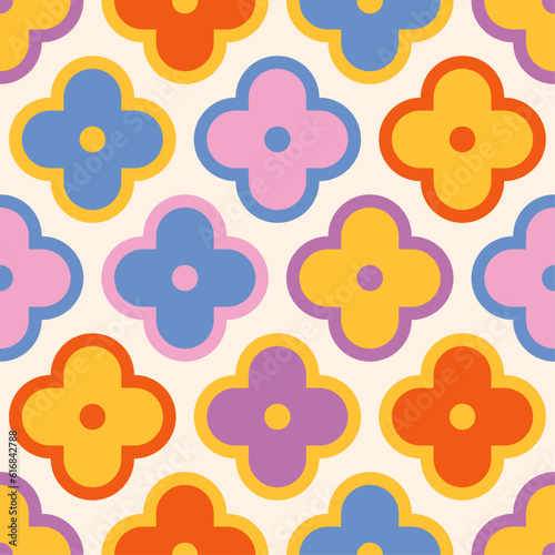 Cute, happy geometric seamless pattern. Bold, abstract, flower shapes in bright pastel colors. Cheerful fun repeat print design for backgrounds, textures and wallpapers.