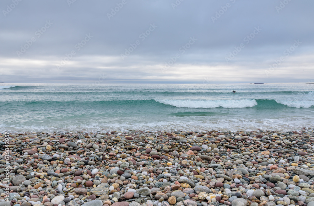 pebbled beach and Atlantic sea with waves pebbled beach and Atlantic sea with waves