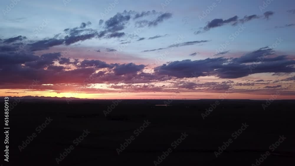 Aerial Shot Of Silhouette Landscape With Mountain Ranges Against Cloudy Sky At Sunset - Billings, Montana