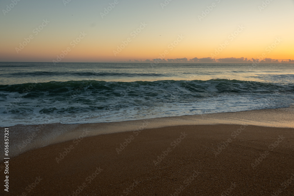 Sunrise on the beach on the east coast of Florida, golden hour