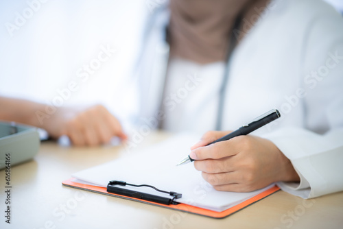 Doctor checking consultation with patient for checkup. work on healthcare paperwork and happiness of medical professional, checklist and report a results in hospital clinic, health insurance business
