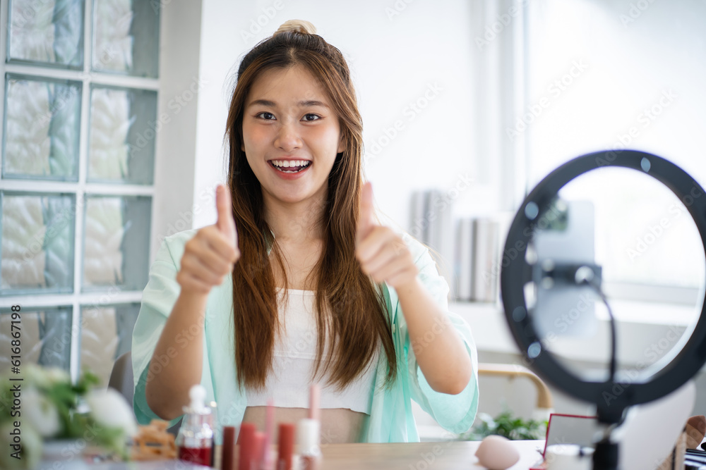 Beauty influencer Asian girl makeup artist . pretty woman looking at camera live streaming Beauty influencer asian girl video online marketing