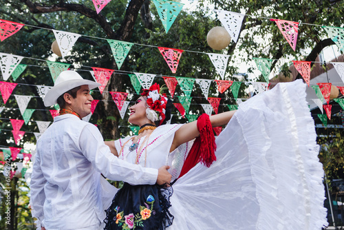 Fotografie Latin couple of dancers wearing traditional Mexican dress from Veracruz Mexico L
