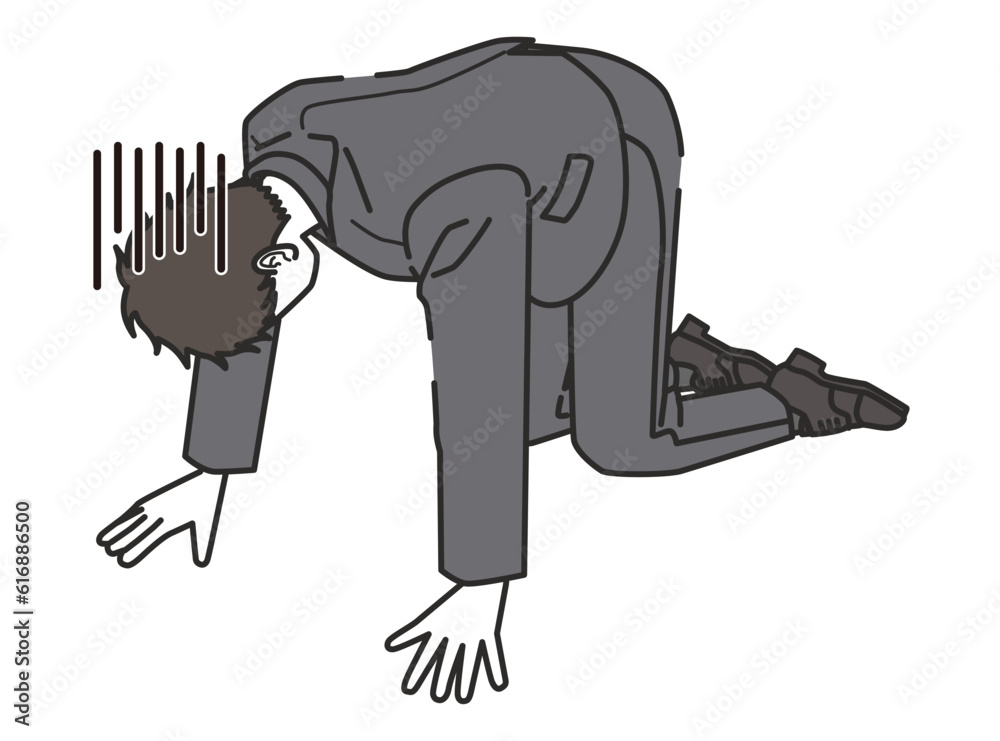 落ち込むスーツを着た男性