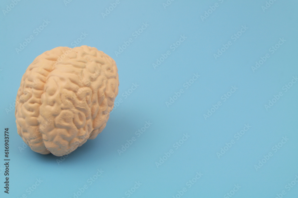 Obraz premium Human brain on blue background with space for text.