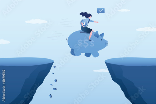 Businesswoman rides big piggy bank and jumps over abyss. Overcoming financial gap, savings save from bankruptcy and poverty. Smart woman saves money and overcome financial crisis