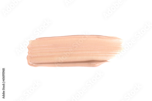 Smudged beige foundation cream isolated on white