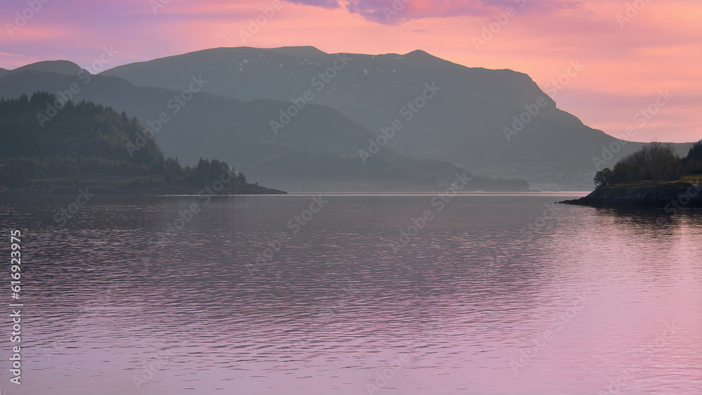 Fjord with view of mountains and fjord landscape in Norway. Landscape at sunset