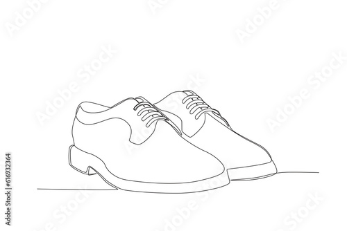 One continuous line drawing of a man's boot 