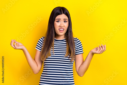 Canvas Print Photo of negative emotion shrug shoulders vietnamese girl wear t-shirt wtf misun