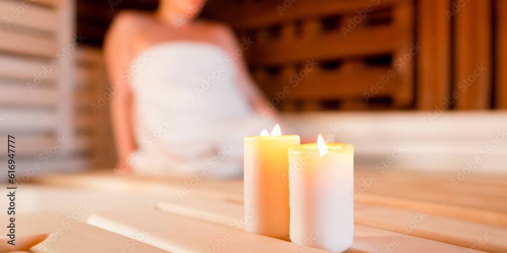 Candle with body therapy massage in the background. Health and body wellness concept. Skin relaxation and treatment. Sauna and regeneration. Healing salt lamp. Ai generative. - obrazy, fototapety, plakaty 