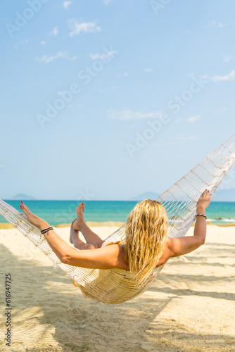 Woman relaxing at the beach