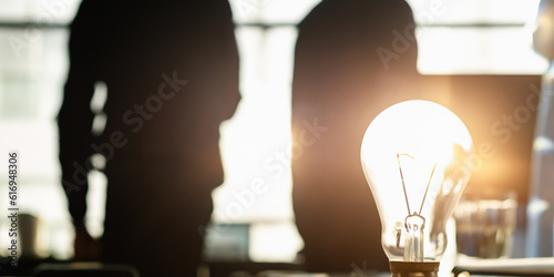 Idea light bulb with business person in the background. Business concept, creativity concept, create solutions in work. Ai generative.