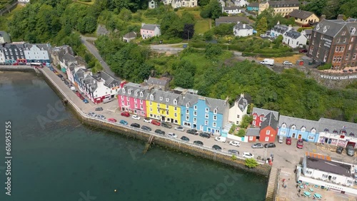 An aerial drone video of Tobermory on the Isle of Mull in Scotland. A small town with colourful houses. 