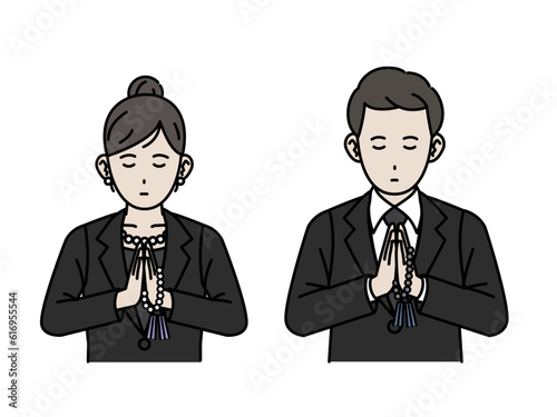 葬儀で合掌、黙祷する男女のイラスト