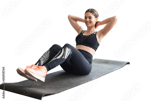 Attractive slim girl in sportswear is doing abs exercise on a transparent background. Healthy lifestyle. photo