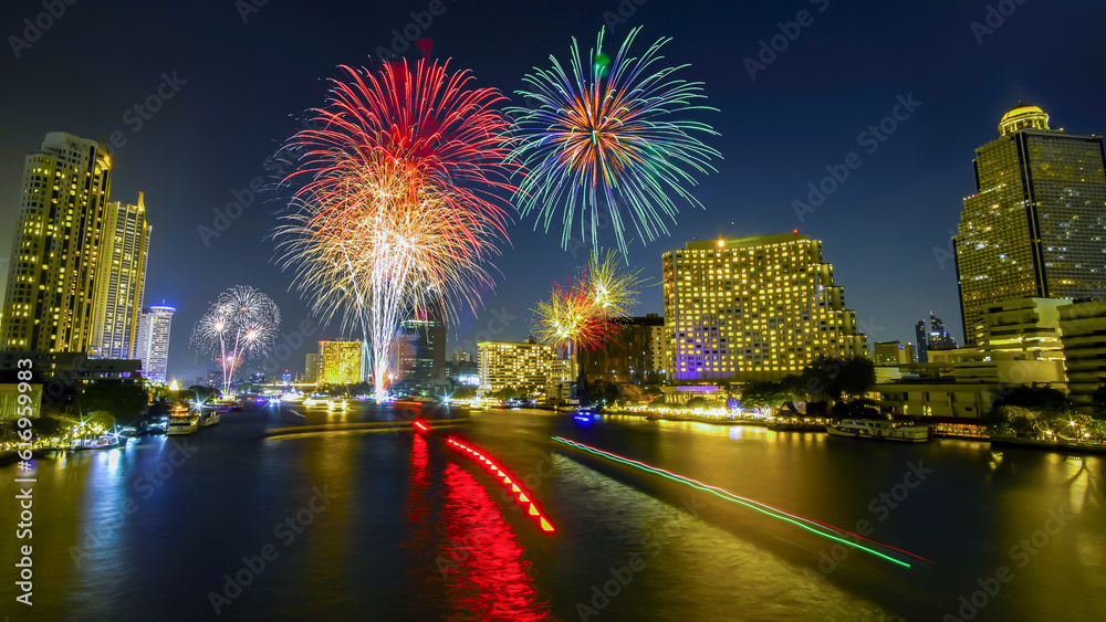 Fireworks to celebrate New Year on the Chao Phraya River in Bangkok, Thailand