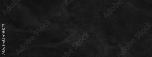 Dark black stone wall grunge backdrop texture background. monochrome slate grunge concrete wall black backdrop vintage marbled textured border background.