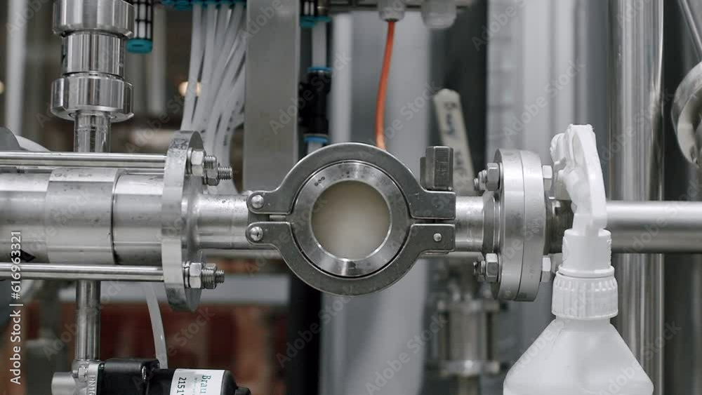 Beer ProductionPouring Malt Grains Into A Large Grinding Tank At The