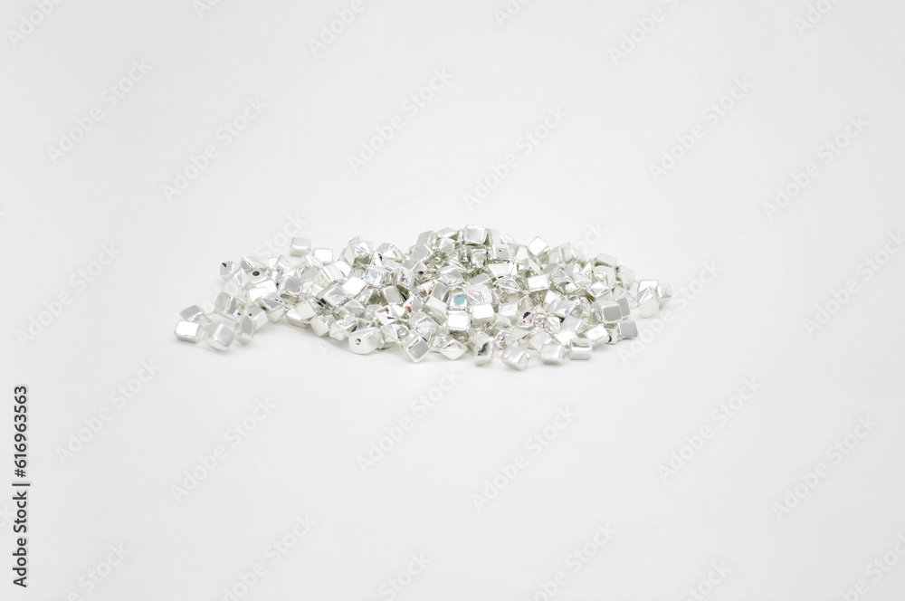 shiny jewelry made of silver on grey background shiny jewelry made of silver on grey background