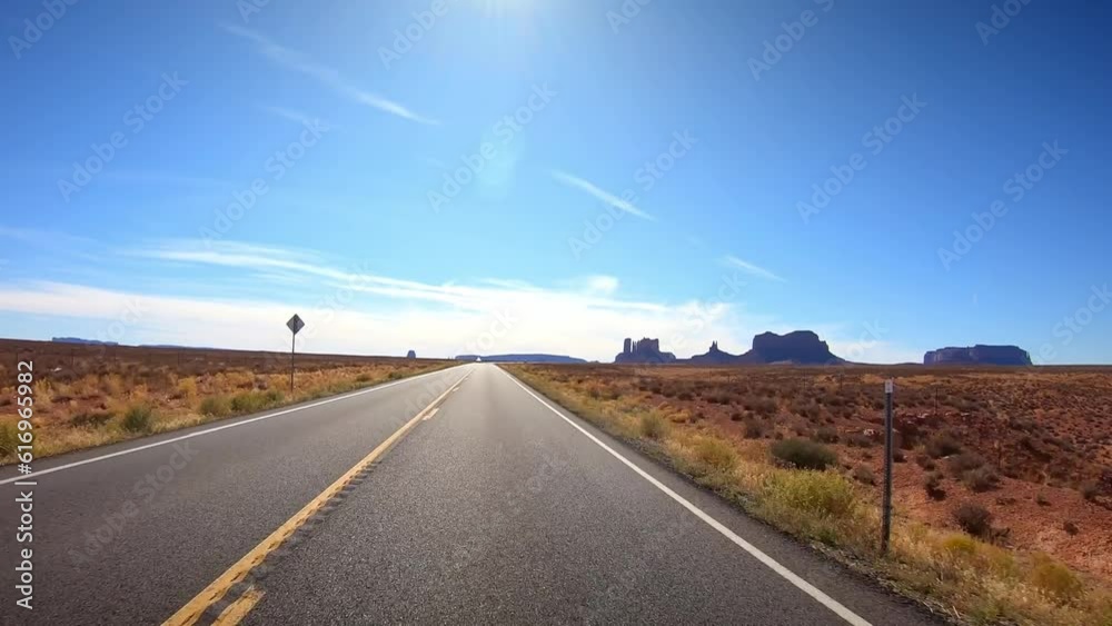 Hyperlapse and timelapse in Monument Valley at Forrest Gump point - Driving on valley drive with western landscape - Cinema and movies filmed guided tour Hyperlapse and timelapse in Monument Valley at Forrest Gump point - Driving on valley drive with western landscape - Cinema and movies filmed guided tour