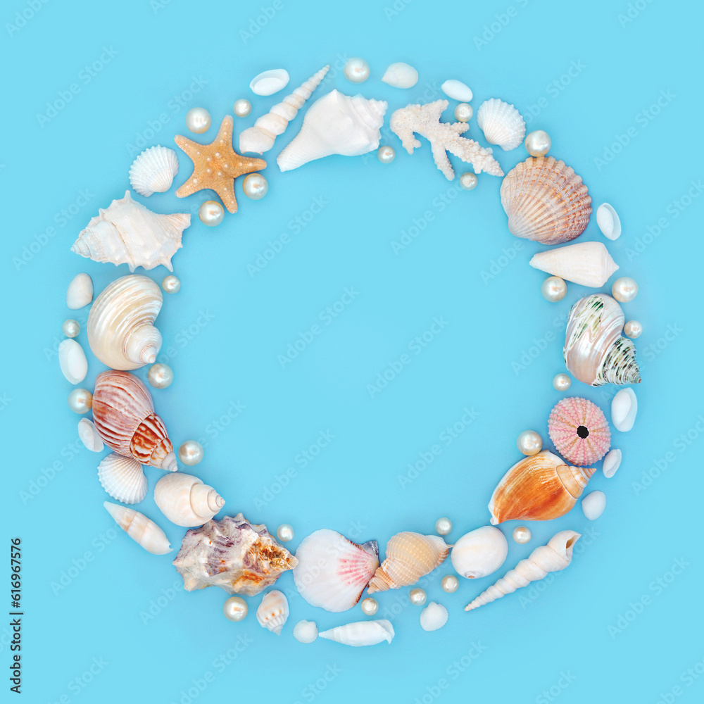 Seashell and oyster pearl abstract wreath on pastel blue background. Large collection of exotic and tropical shells, natural nature design. Seashell and oyster pearl abstract wreath on pastel blue background. Large collection of exotic and tropical shells, natural nature design.