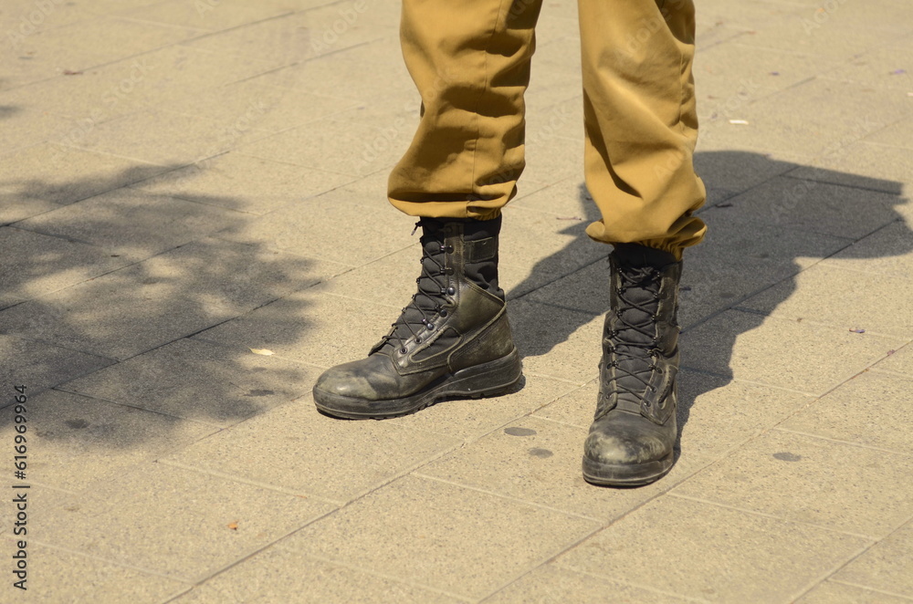 Israel Defense Forces. Concept: the life of a soldier. Close-up of the leg and army boots. Tzahal soldier. Israeli army. 