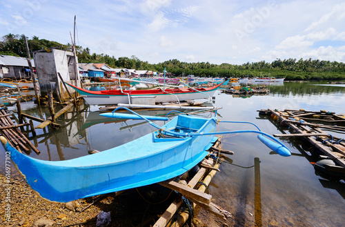 Traditional fishing boats harbour at Siargao, Philippines.