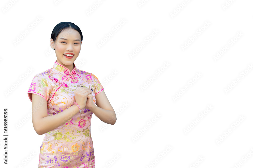 Beautiful Asian woman with long hair who wears pink Cheongsam dress in Chinese new year theme while she shows her hand as Chinese greeting with on white background. Beautiful Asian woman with long hair who wears pink Cheongsam dress in Chinese new year theme while she shows her hand as Chinese greeting with on white background.