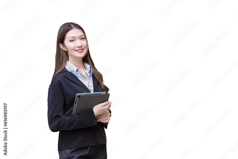 Professional Asian young business female in black suit smiles happily while she works and holds tablet isolated on white background. Professional Asian young business female in black suit smiles happily while she works and holds tablet isolated on white background.