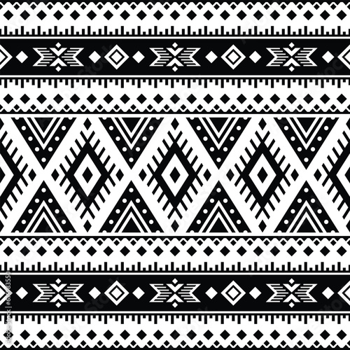 Aztec geometric seamless ethnic pattern. Black and white colors. Ornament traditional. Design for textile, fabric, clothes, curtain, carpet, batik, ornament, background, wrapping, paper, wallpaper.