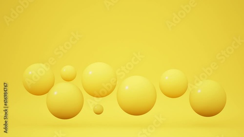 Abstract minimal 3D background of 3D bright yellow balls floating on yellow background