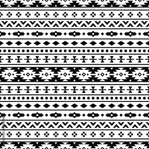 Seamless ethnic pattern in black and white colors. Tribal vector illustration with Native American style. Design for textile templates, fabric, clothing, curtain, rug, ornament, background.