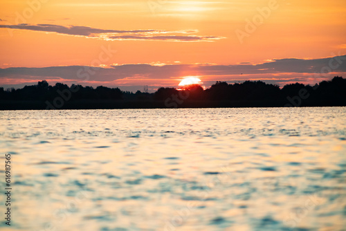 abstract background of waves at sunset