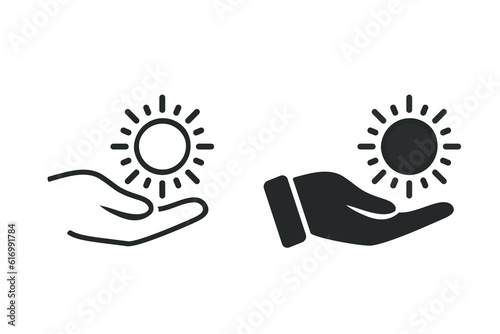 Hand holding sun icon. Illustration vector